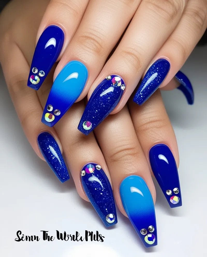 Coffin-shaped Blue Nail Designs with ombré and glitter.