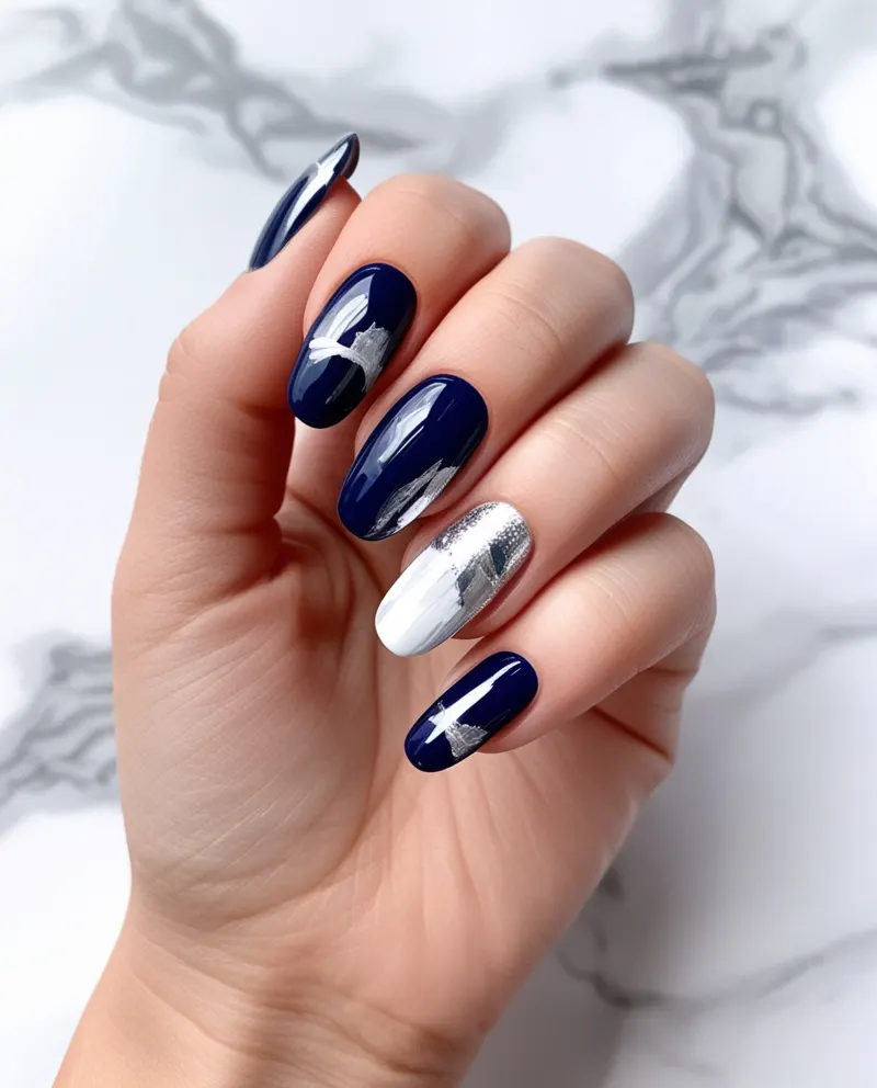 Blue nails with creative abstract art for a unique Valentine’s look.