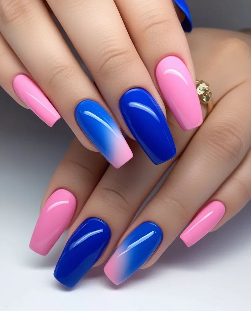 Colorful nails combining pink and blue shades for a fun, summery look.