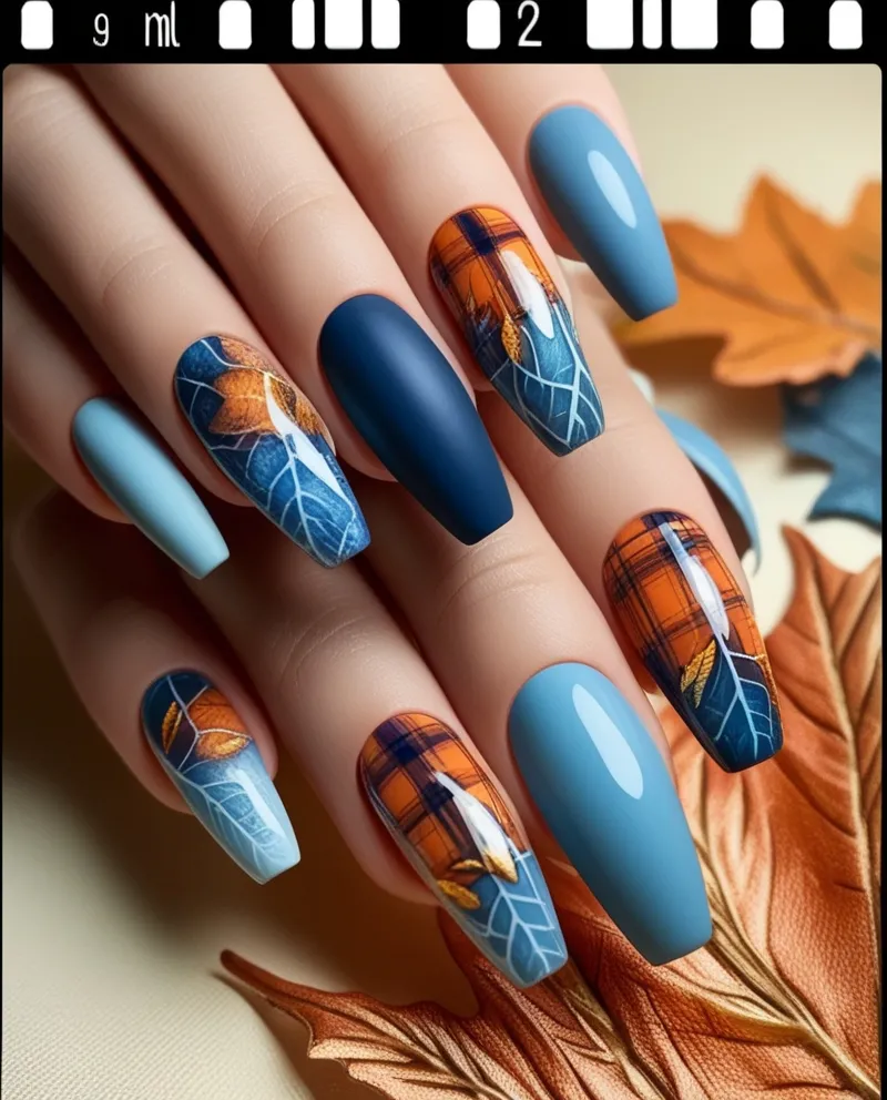 Autumn-inspired Blue Nail Designs with gold and orange accents.