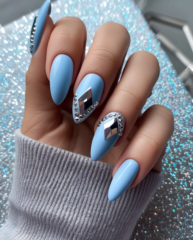 Blue nails with diamond accents for a chic Valentine’s look.