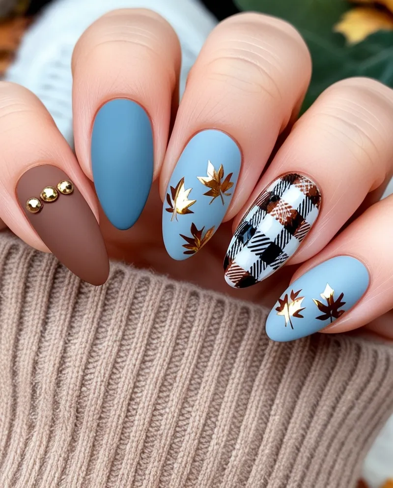 Blue Fall Nail Designs with gold and brown accents for autumn.