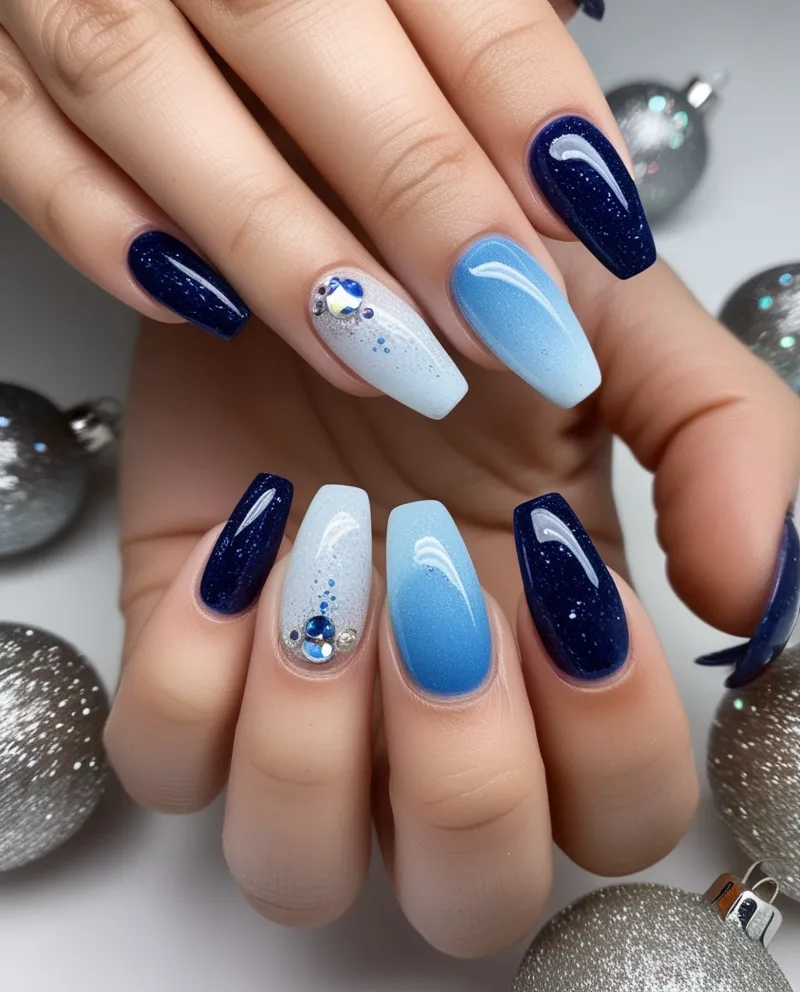 Glittery blue gradient nails, a frosty and sparkling Blue Christmas Nails idea.