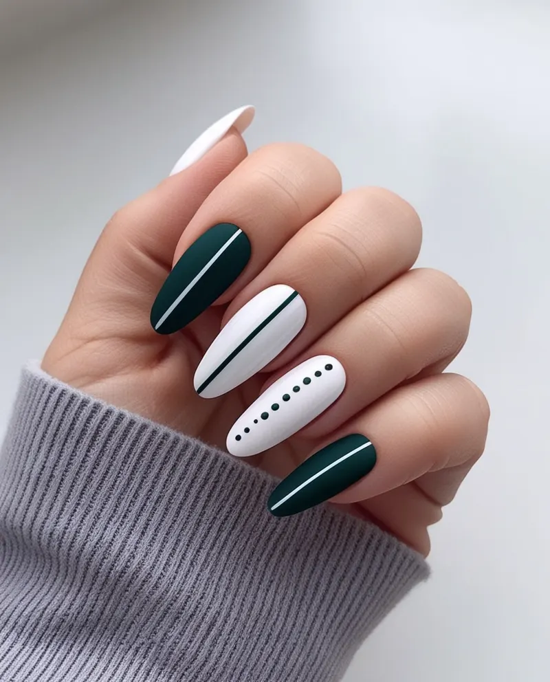 Simple and stylish nails with minimal designs like lines and dots.