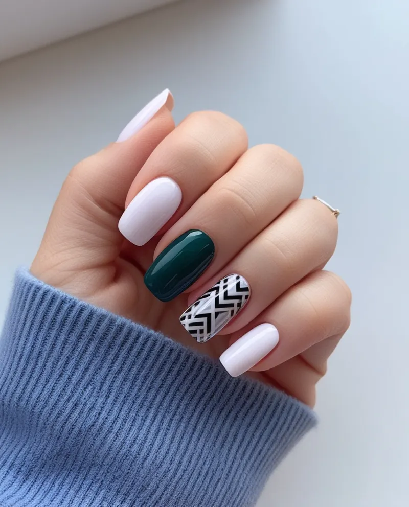 Square nails with sharp edges and geometric patterns.