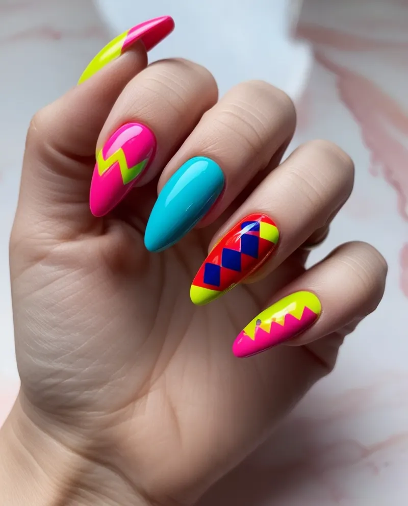 Funky nails with geometric shapes and bright colors.