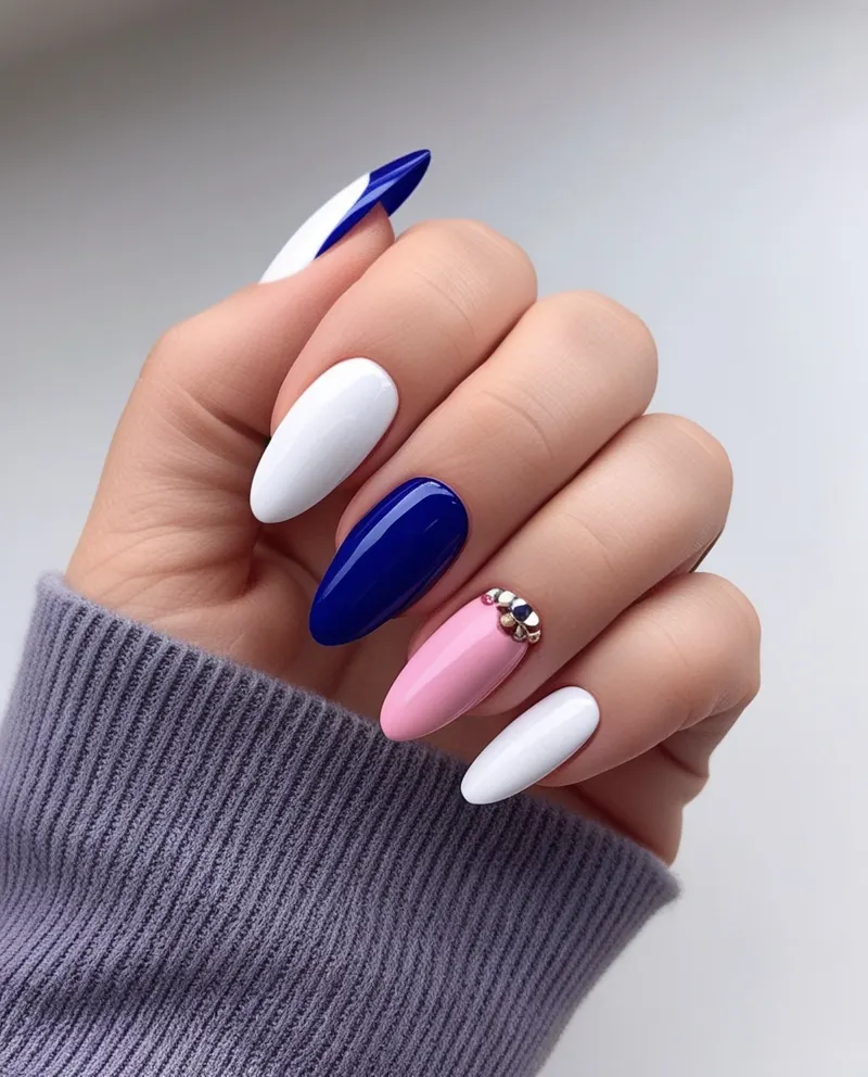 Inverted French manicure nails with colored bases for a fun twist.