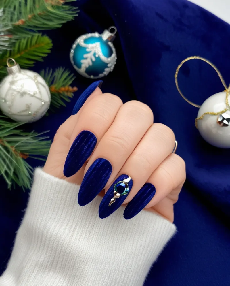 Textured blue velvet nails, a soft and rich Blue Christmas Nails style.