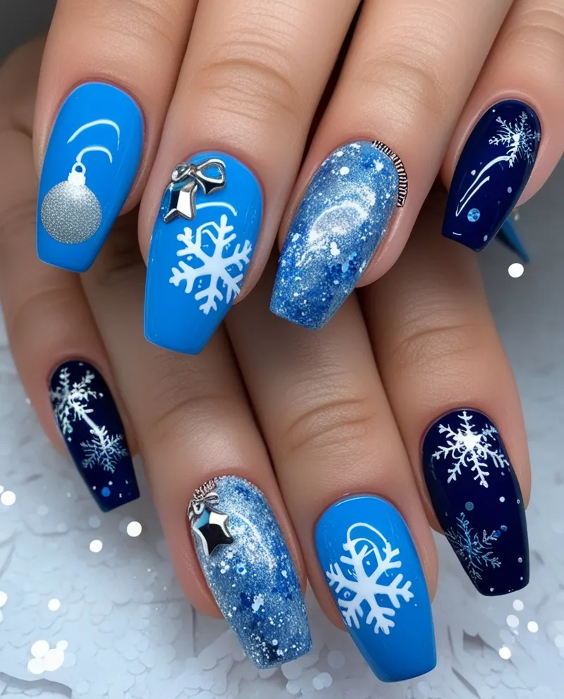 Festive Blue Nail Designs with snowflakes and ornaments for Christmas.