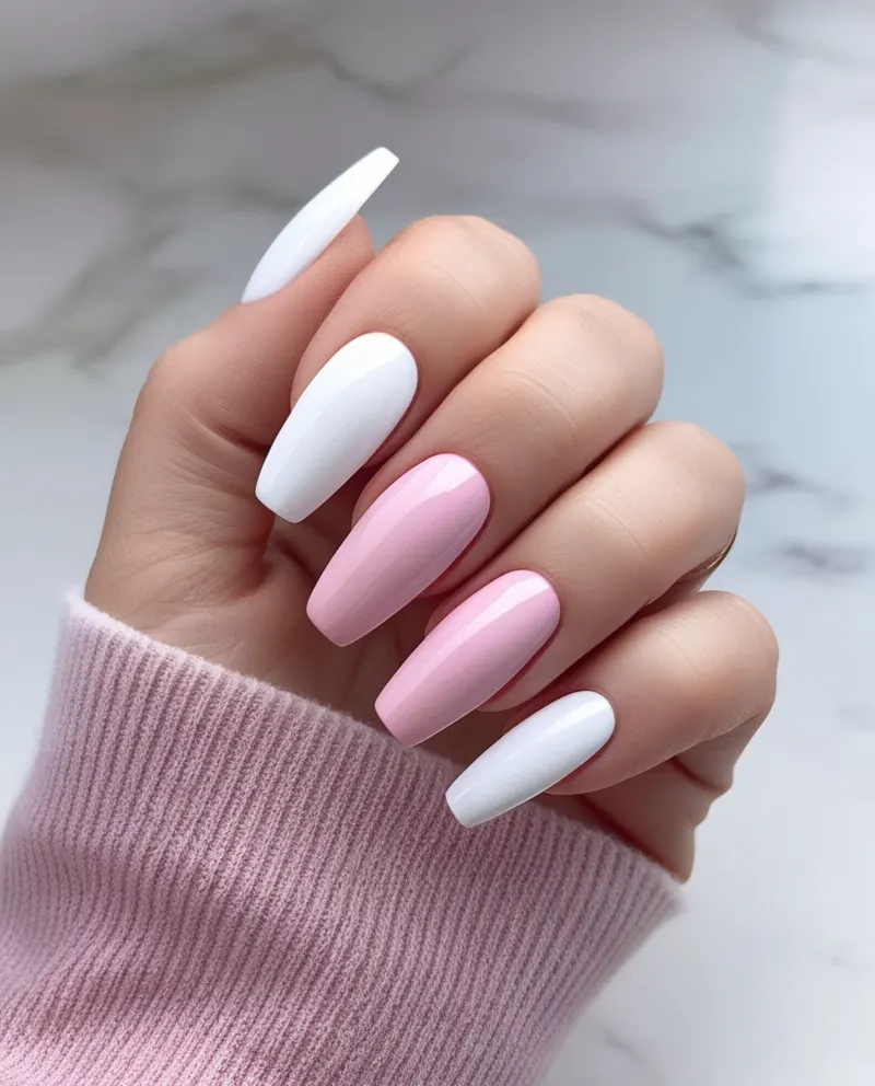 Classic French tip nails with a nude base and white tips.